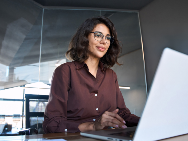 a woman conversing with ai agents on her computer