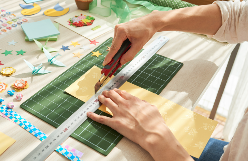 Hands working with paper