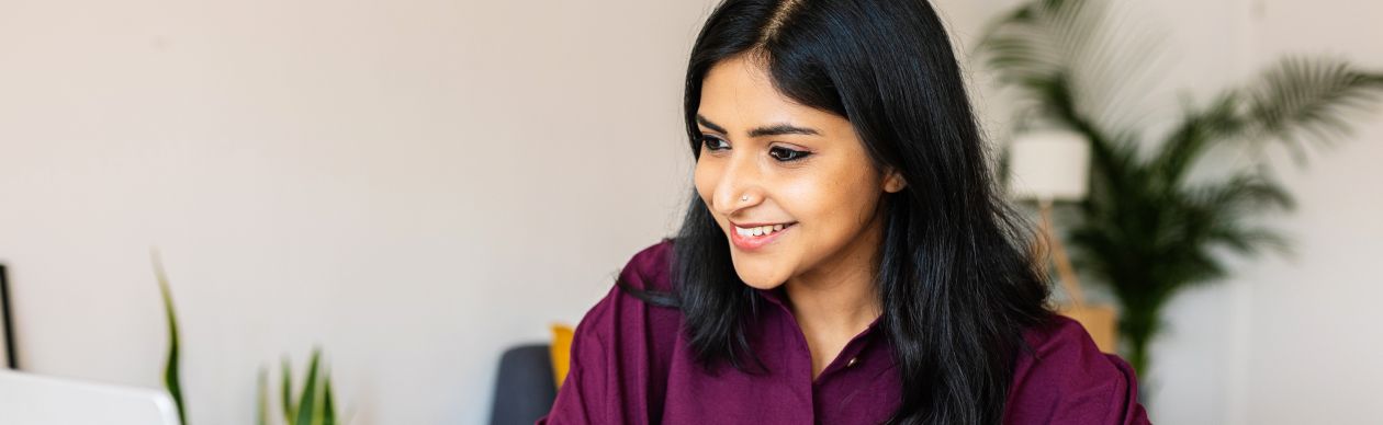 A CX expert going through the software renewal process on her computer