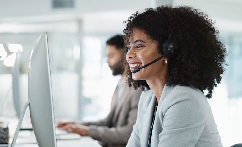 A lady using AI in voice for customer service