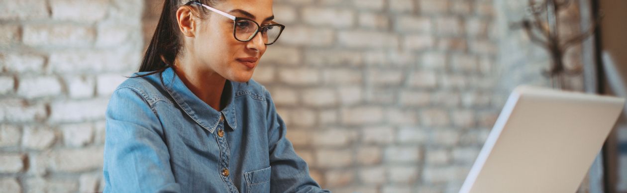 lady building a customer-focused business strategy on her laptop