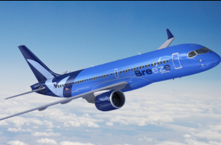 Breeze airplane flying above clouds