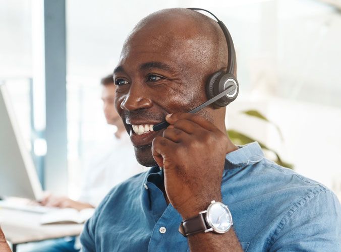 Customer service agent on headphones