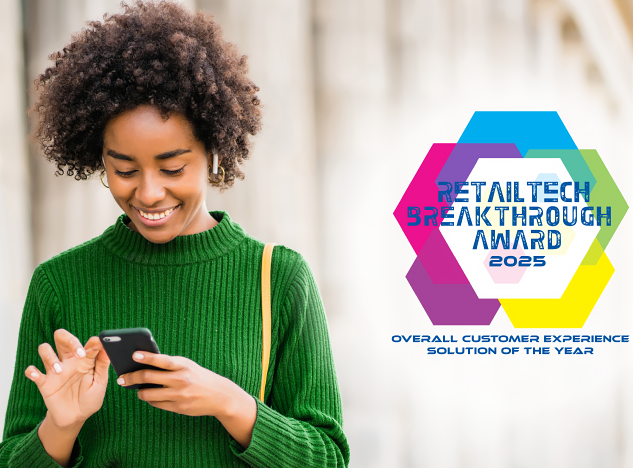 woman smiling at phone