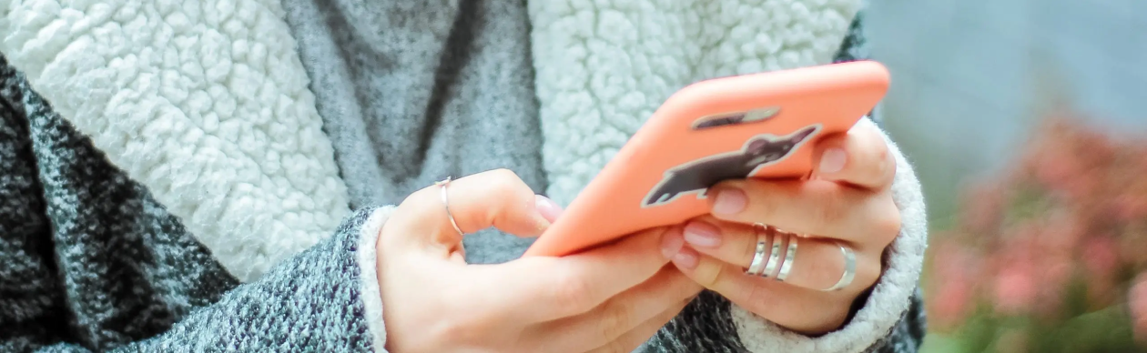 A woman texting on her phone