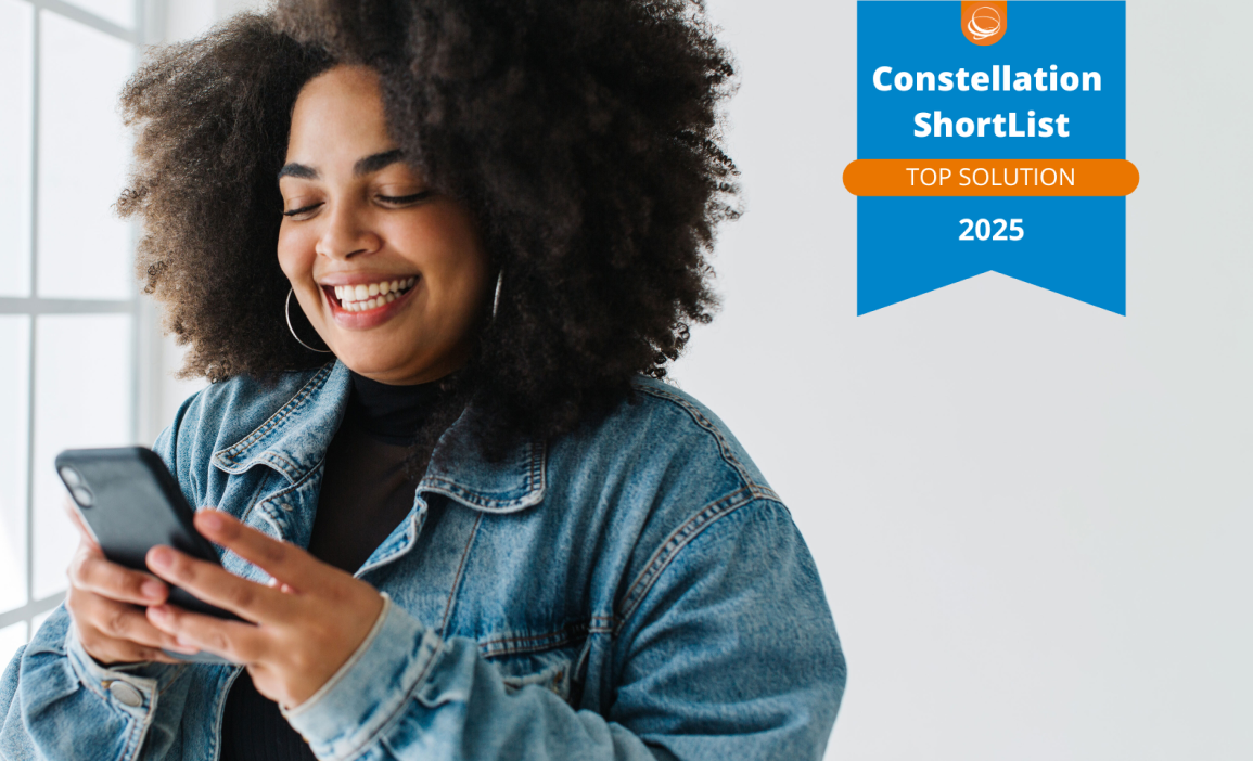 Smiling woman looking at a smartphone. On the right, a badge displaying "Constellation Shortlist Top Solution 2025."