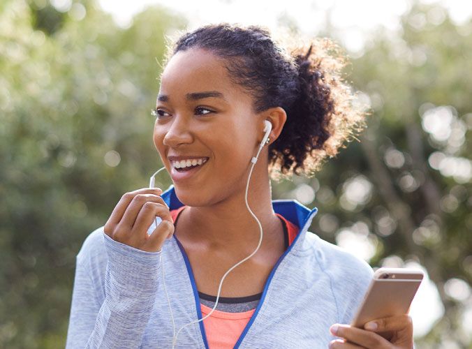 Woman on the phone while on a run