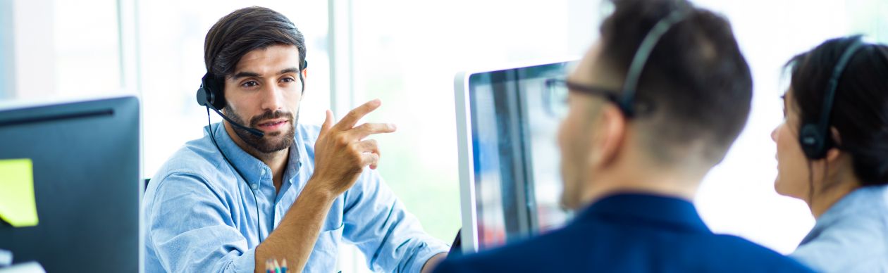 Three customer service agents at work