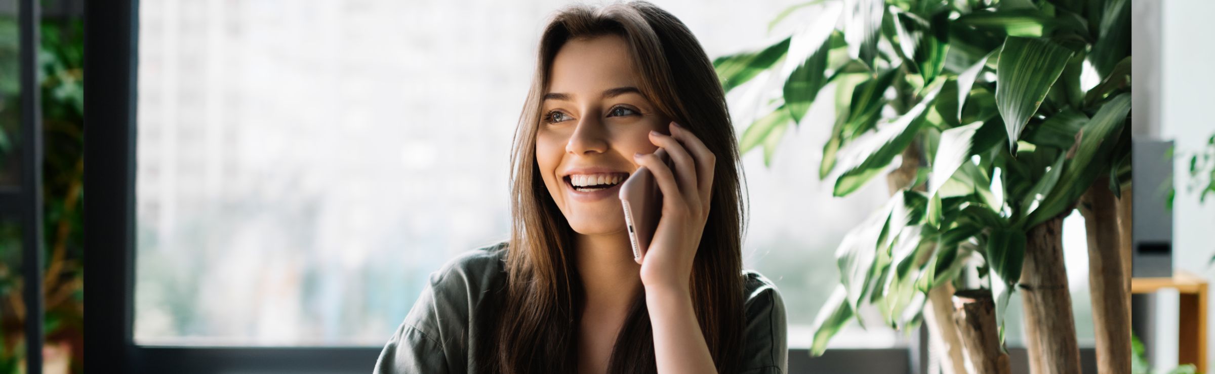 Woman speaking on phone with AI agent Sidekick Voice from Gladly