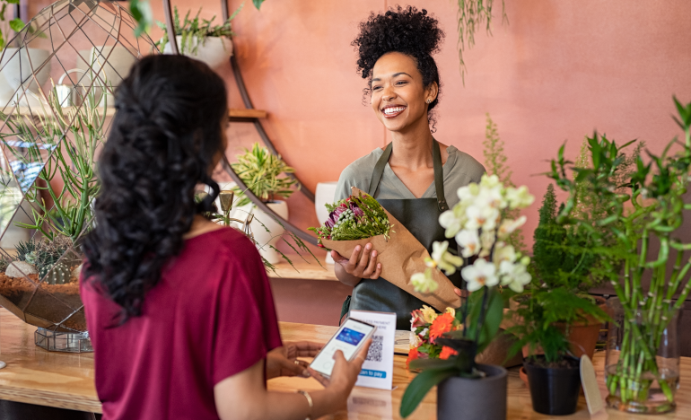 Customer purchasing a bouquet of flowers