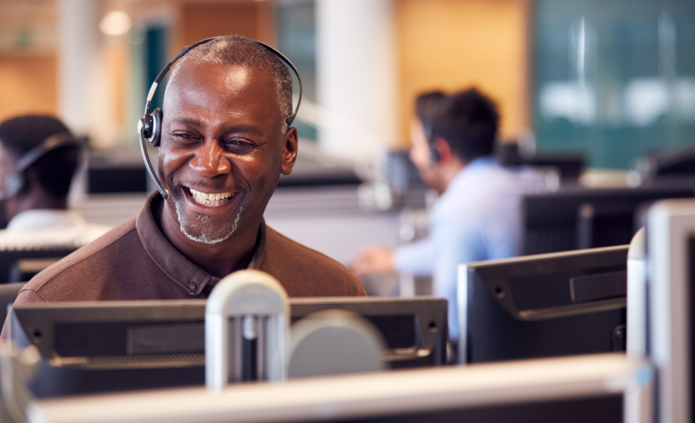 male customer service agent laughing