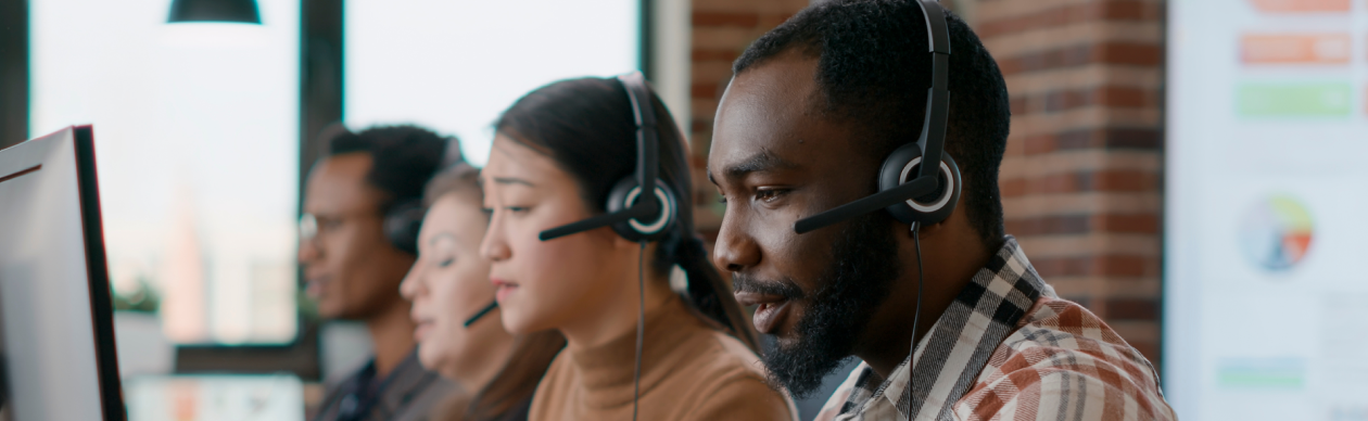 Four customer service reps at work