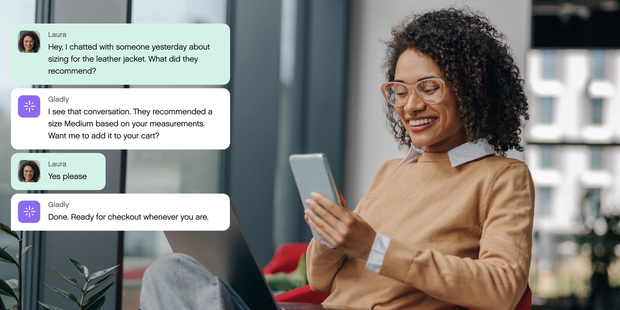 A woman smiles while looking at her phone. On the screen, a chat with a digital assistant discusses leather jacket sizing and purchase readiness.