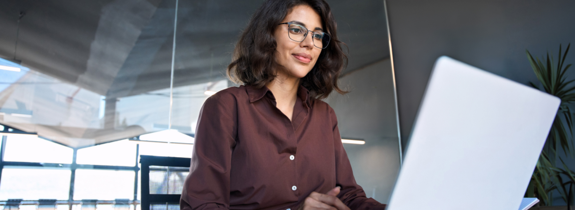 a woman conversing with ai agents on her computer