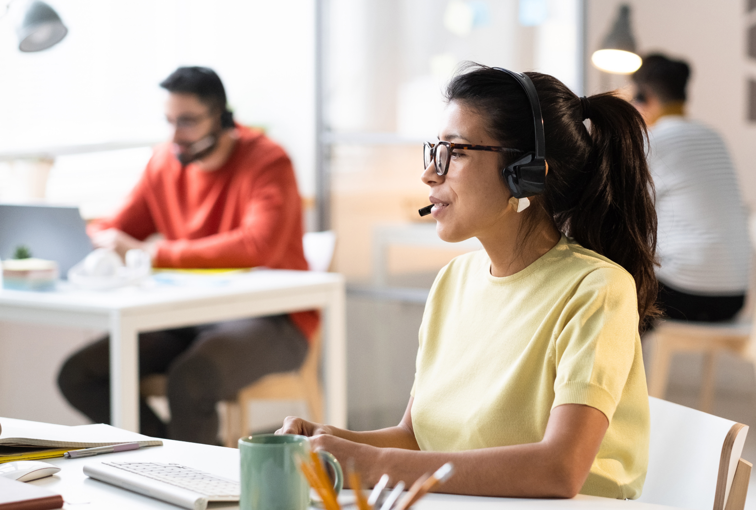 Customer service employee talking on a headset