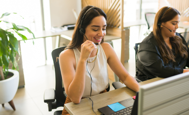 Customer service agents doing their jobs in an office