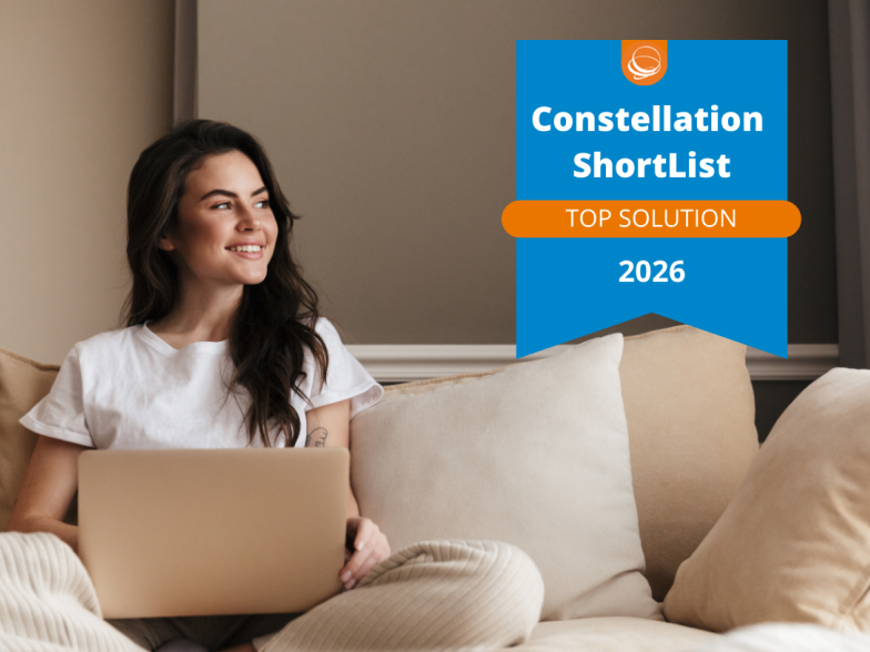 Woman smiling at laptop with Constellation ShortList 2026 Top Solution badge