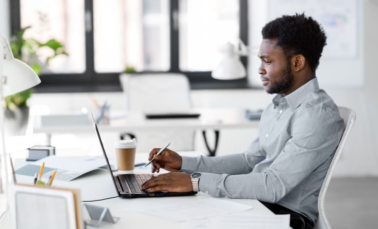 CX practitioner working at call center forecasting call volume