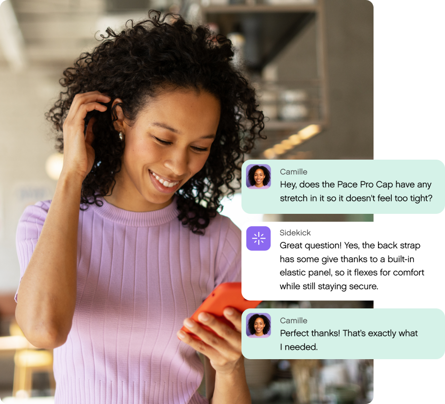 A woman with curly hair in a purple top smiles while holding an orange phone. Chat messages beside her discuss a cap's stretch and comfort features.