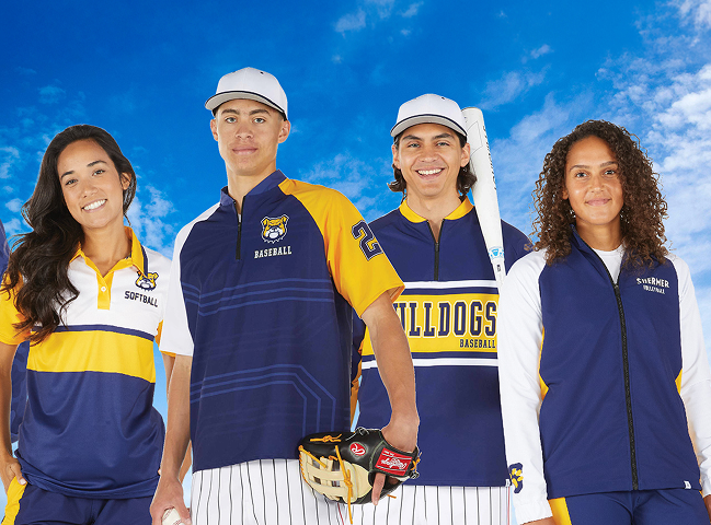 Four athletes stand under a blue sky, smiling in sports uniforms for softball and baseball. They convey teamwork and enthusiasm.