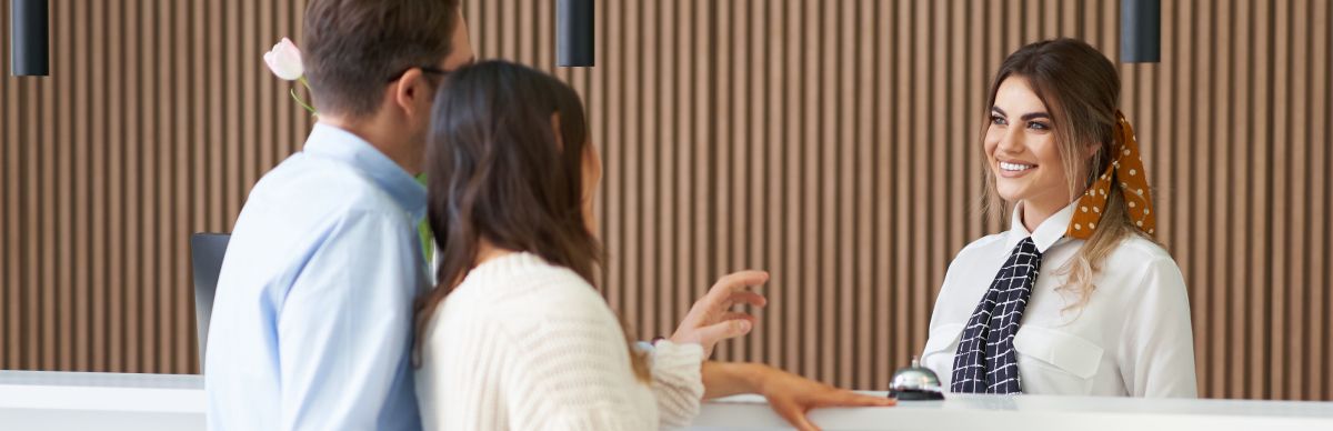 hospitality woman greeting guests