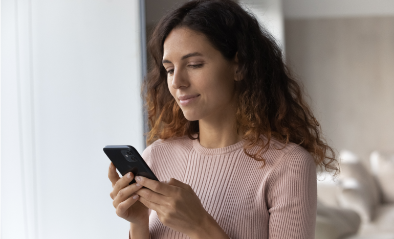 Woman using her mobile phone