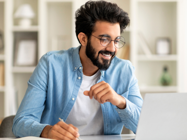 CX leader working on his computer
