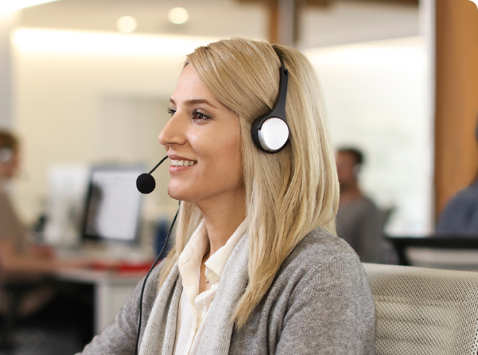 Woman with headset smiling