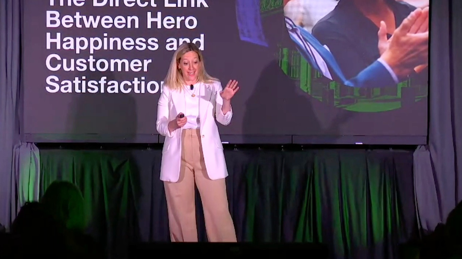 Susan Tynan speaking onstage at Gladly Connect Live