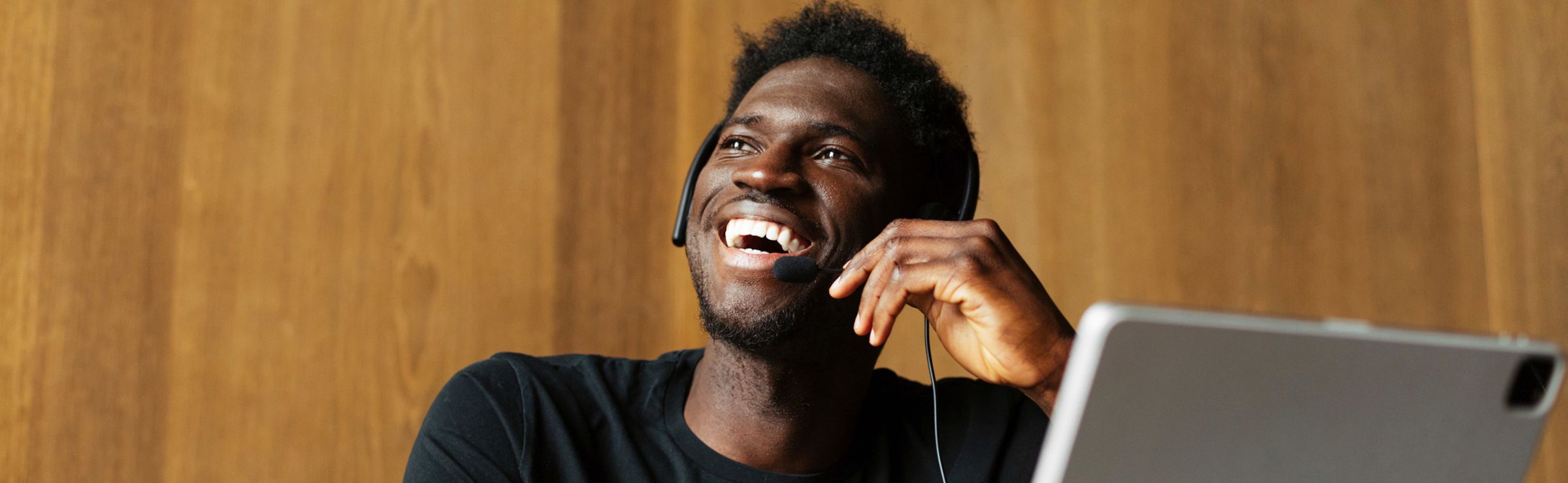 Smiling customer service rep talking on the phone