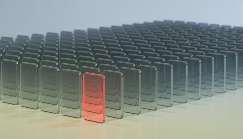 Large grid of upright frosted glass tiles receding into the distance, with a single red tile standing out near the front