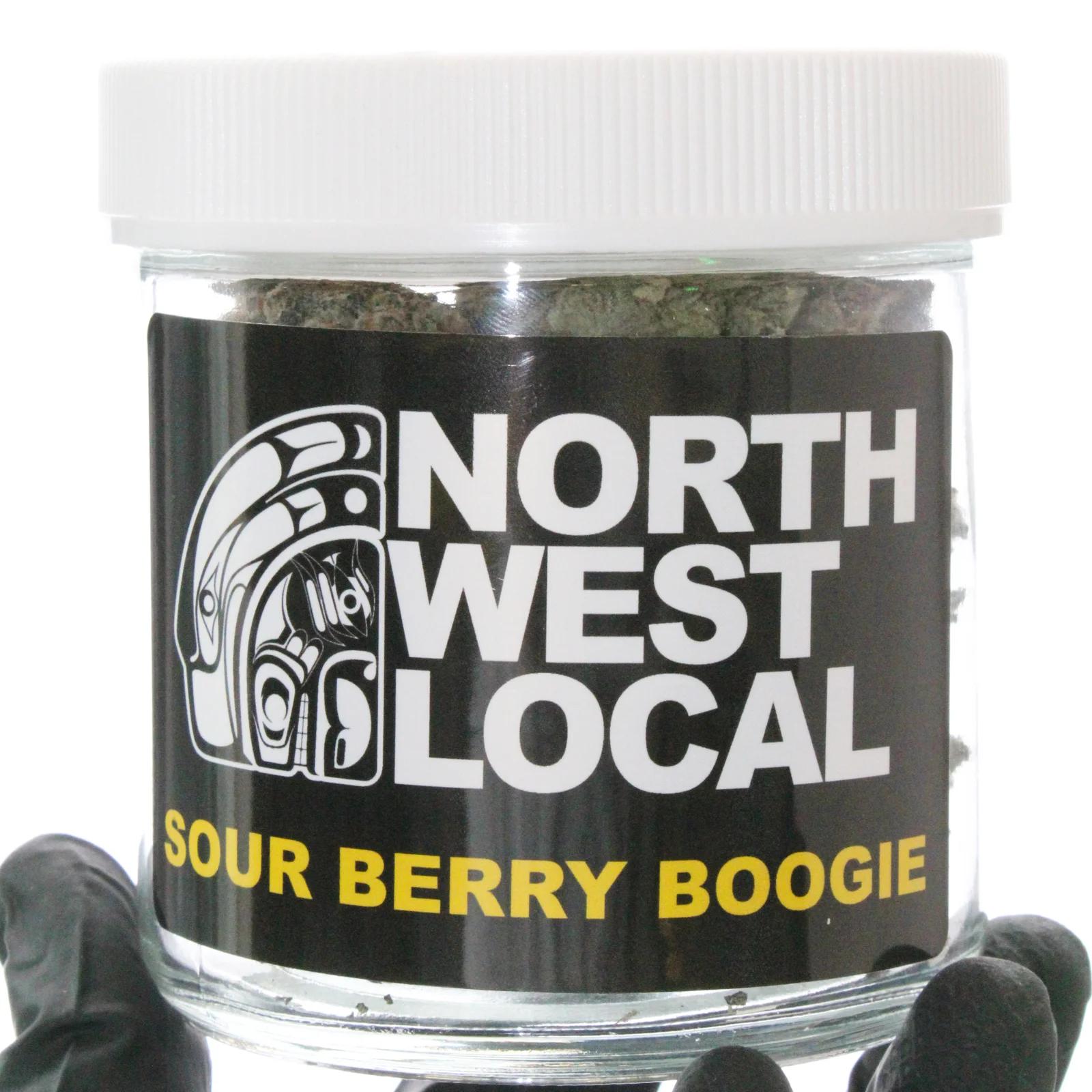 Sour Berry Boogie flower packaged in a Northwest Local Cannabis 28 gram jar