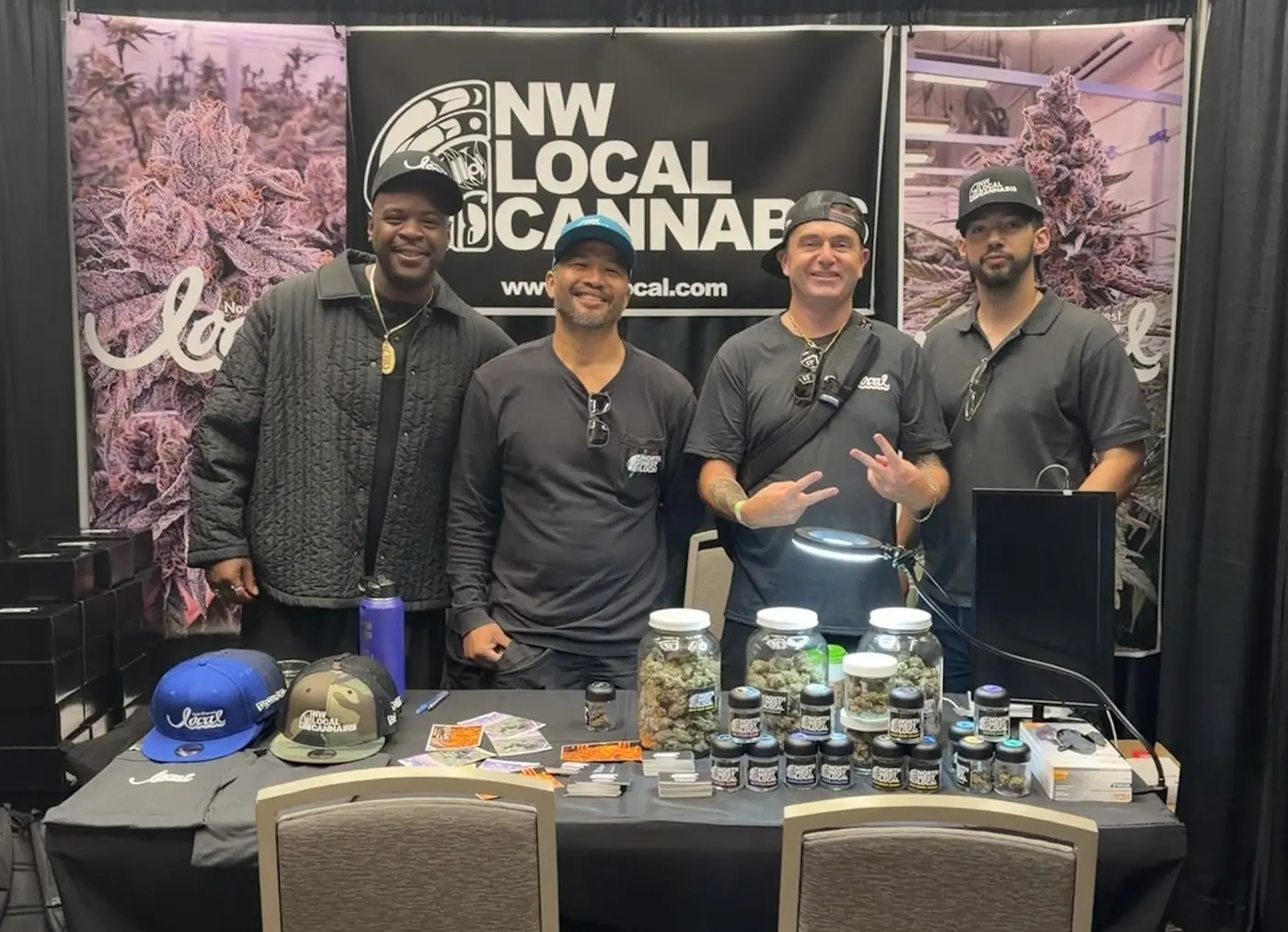 Yohiness, Oloth, Benny, and Gavin at the booth