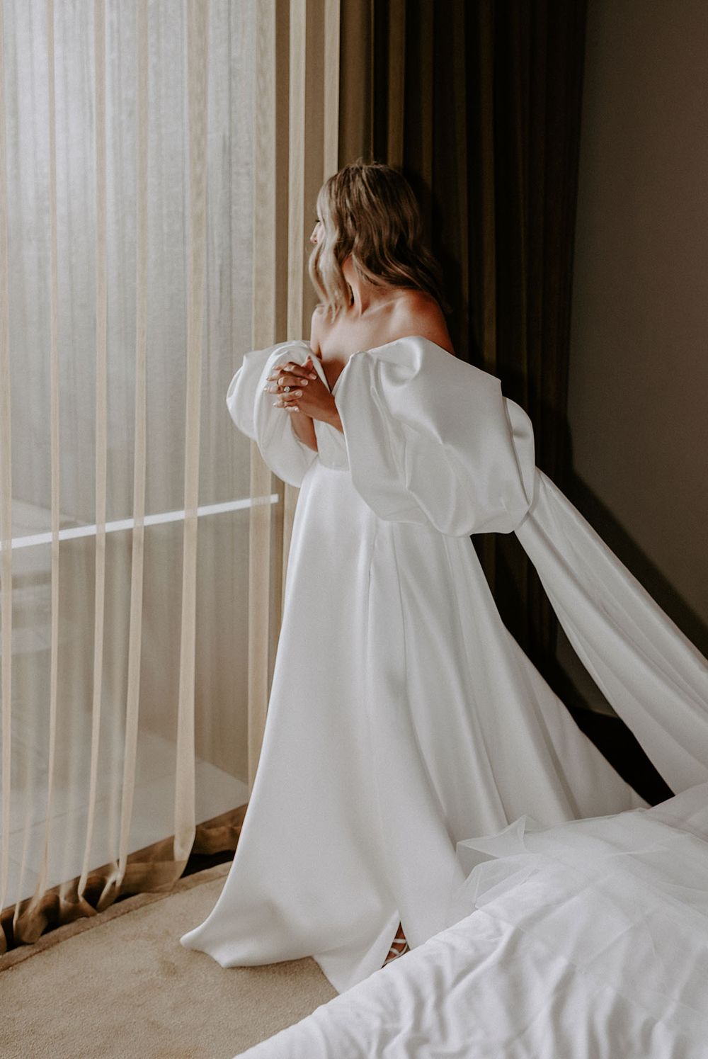 KYHA bride in Elle Gown with thigh split and big sleeves