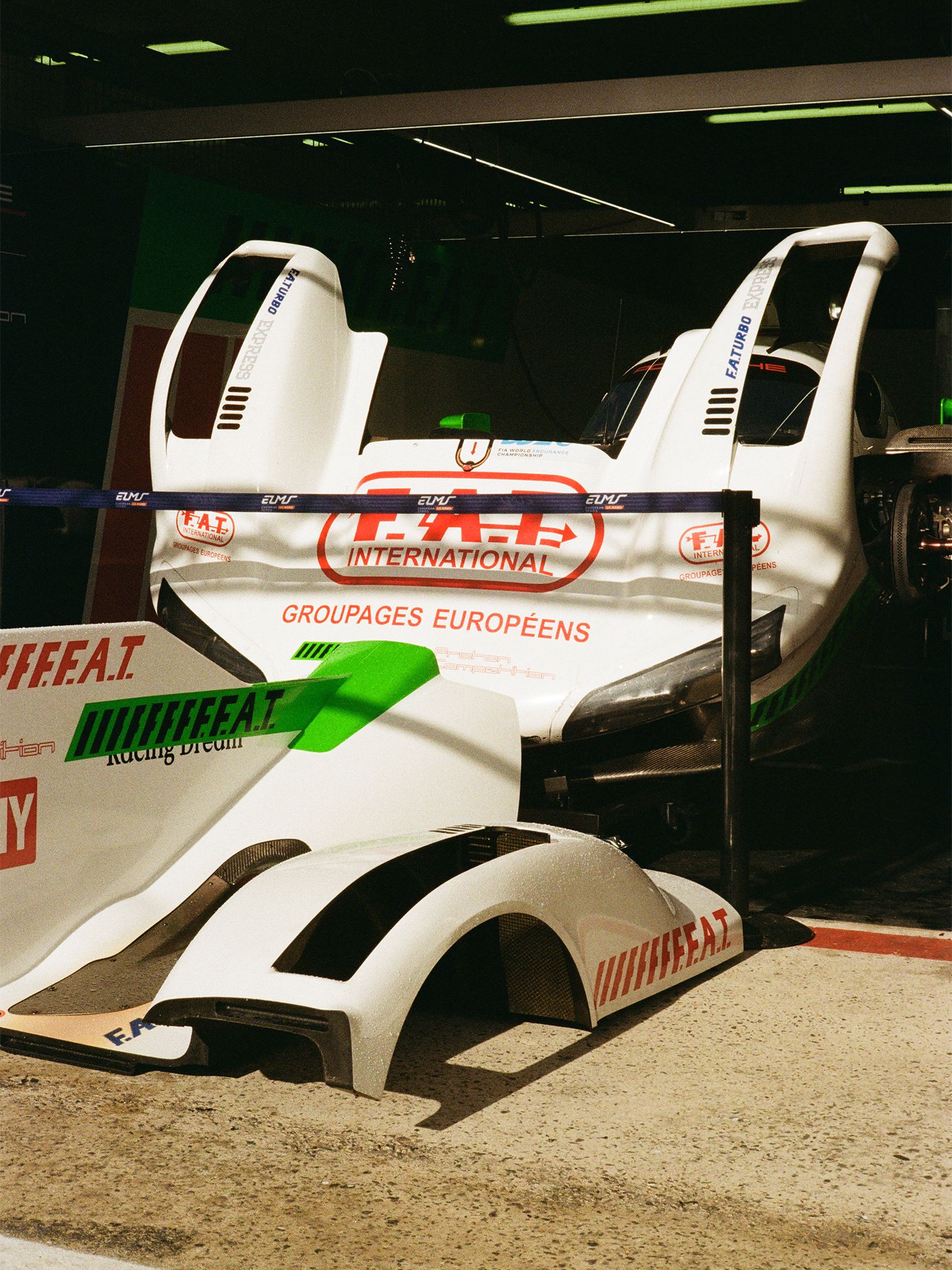 Hood and back wing of the 963 with a special white, green, and red livery calling back to our iconic win at Le Mans 1994