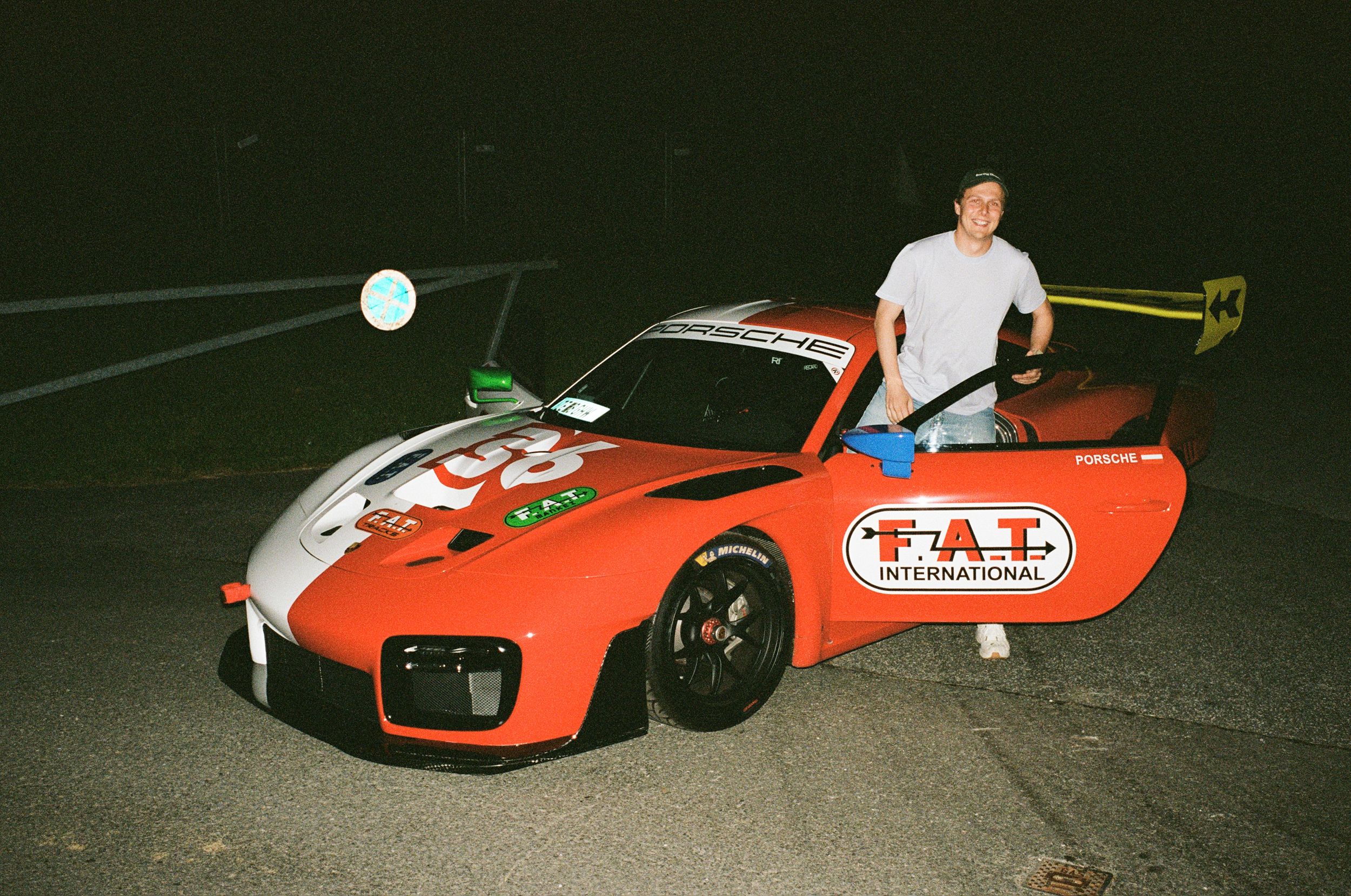 Ferdi getting into the new Porsche 935 with FAT livery in white and red; one of 77 produced worldwide paying tirbute to the Porsche 935/78 nicknamed "Moby Dick" by the fans because of it's elongated shape, massive wing, and unique white colorway.