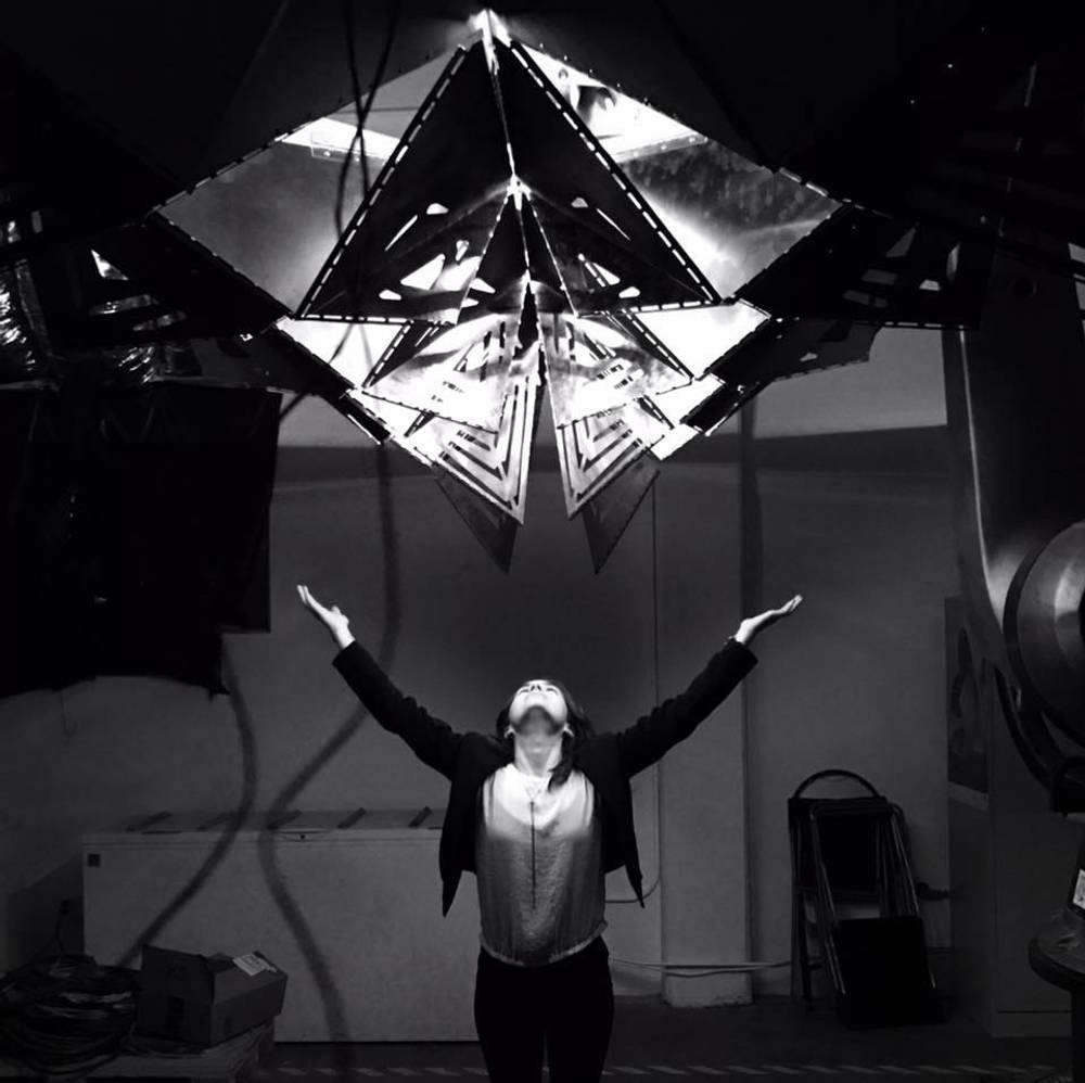 Michelle Pauly beneath the Stealth installation (UCLA IDEAS, M.ArchII, 2017)