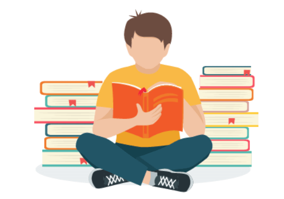 a boy is sitting on the floor reading a book