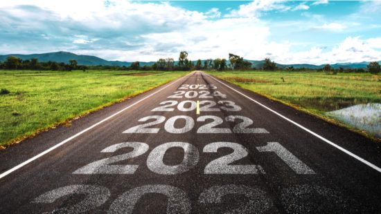 a road with the numbers 2022 , 2023 , 2024 and 2025 written on it .