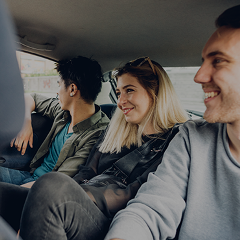 The power of culture and vision image of people in the backseat of a car