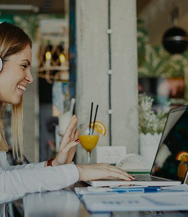 Risks & bets with Jonas Kjellberg image of woman smiling while speaking via laptop 