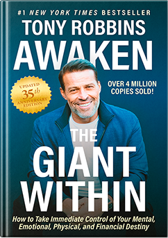 Book cover for Tony Robbins' "Awaken the Giant Within," featuring a smiling photo of the author.