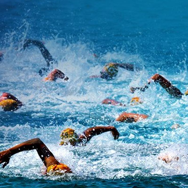 How to make competition irrelevant image of people swimming in an ocean race