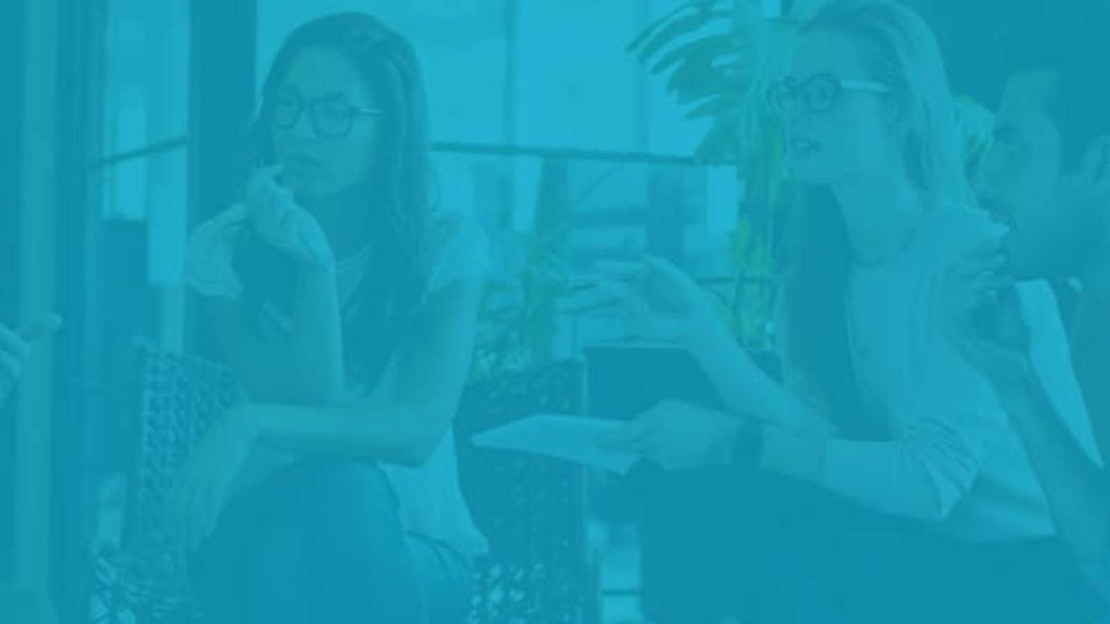 a group of people are standing next to each other on a blue background .