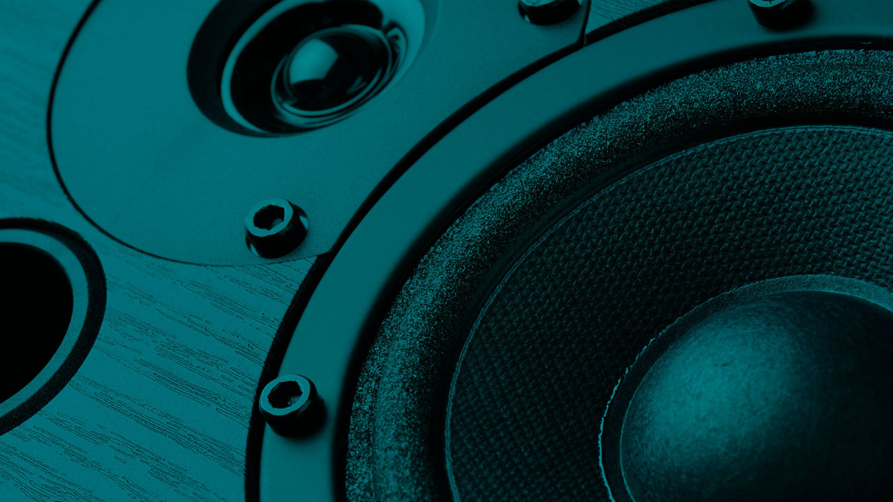 a close up of a speaker with a blue background