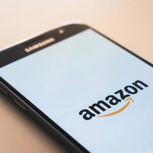 a close up of an amazon logo on a cell phone .