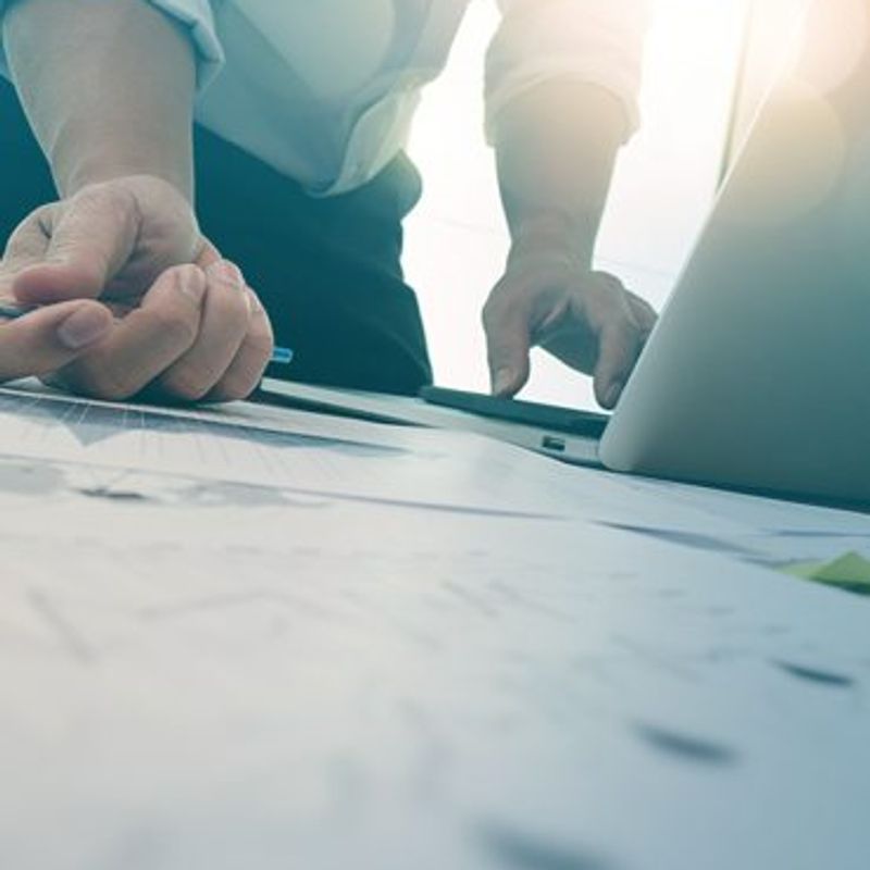 The power of habits Image of hands on a laptop and desk