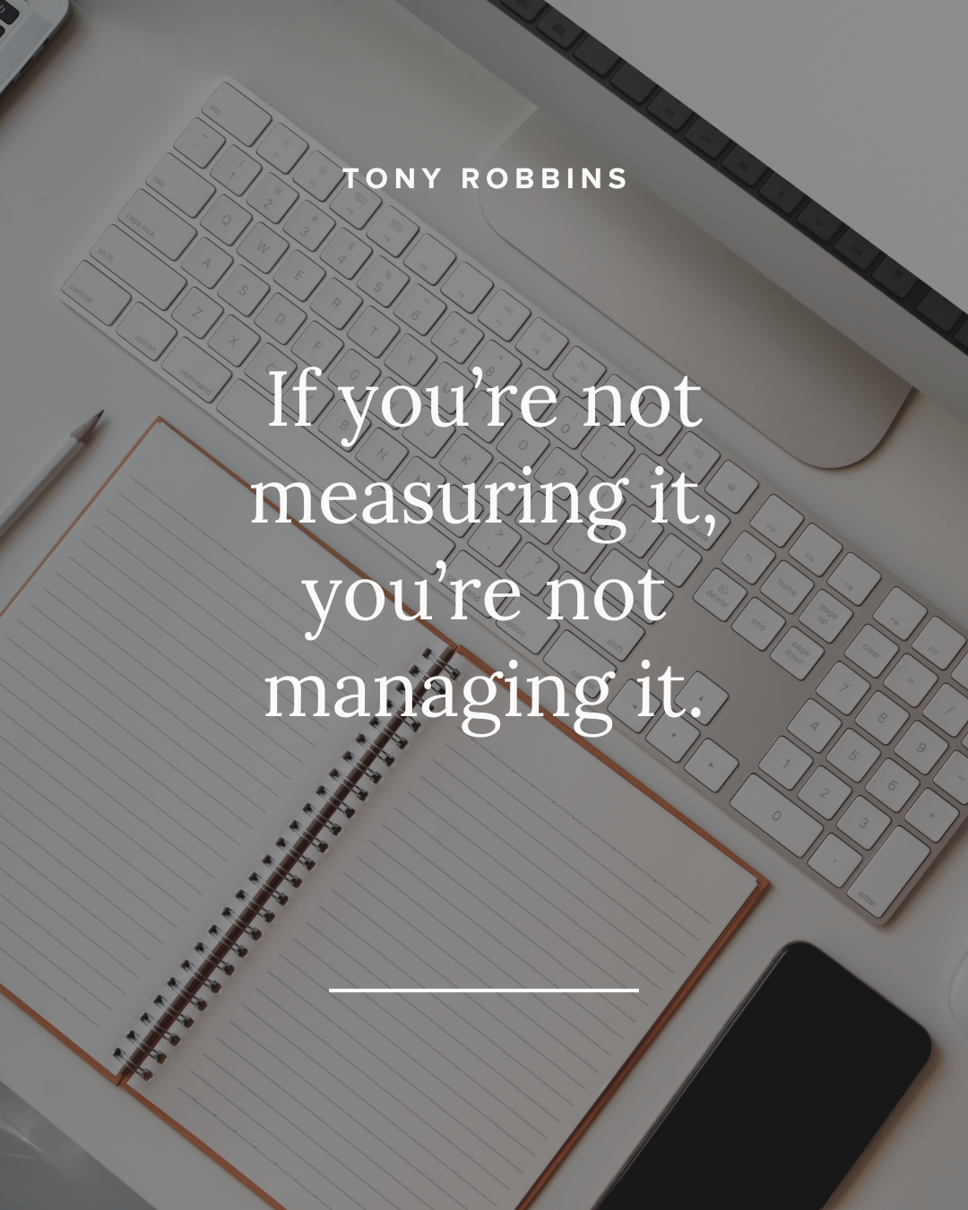 a quote by tony robbins is displayed on a desk