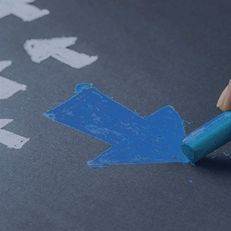 Secrets of the ultimate sales machine image of blue chalkboard arrow