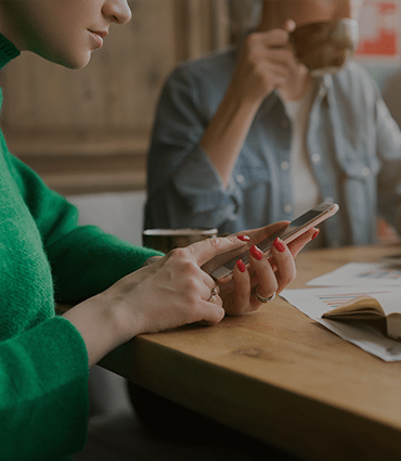 Obsessions, Addictions and Compulsions image of woman looking at phone